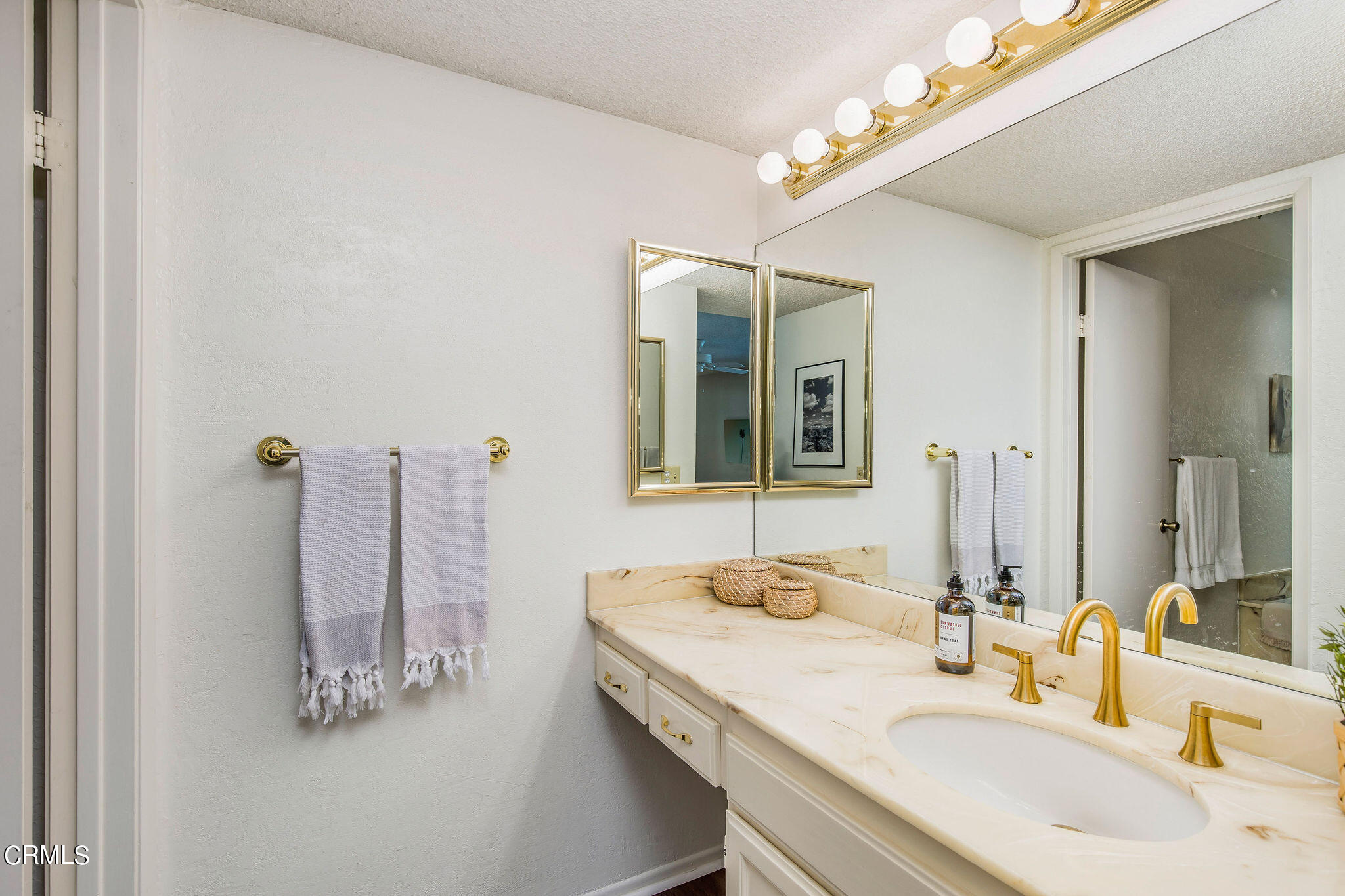 460 Fairview Avenue, Unit 12 Arcadia, CA 91007 - Photo 23 of 25 a bathroom with a sink vanity and a mirror