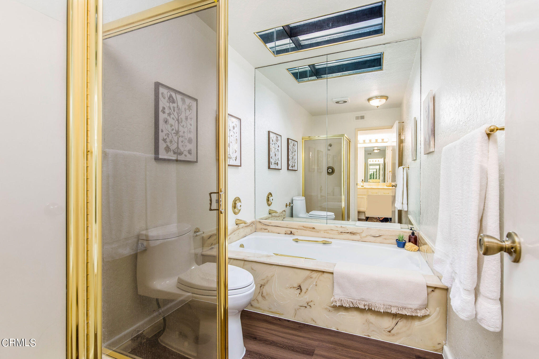 460 Fairview Avenue, Unit 12 Arcadia, CA 91007 - Photo 24 of 25 a bathroom with a granite countertop sink mirror and toilet