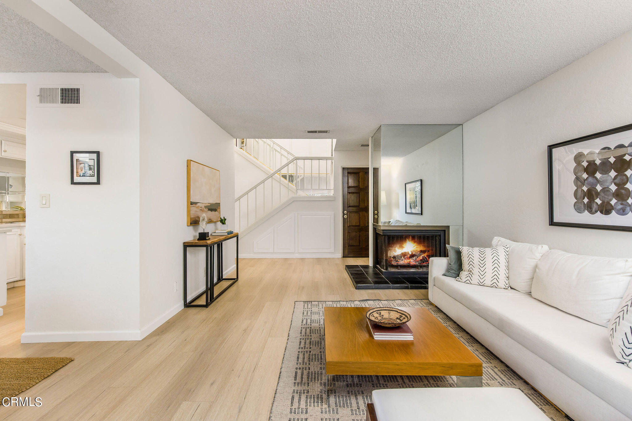 460 Fairview Avenue, Unit 12 Arcadia, CA 91007 - Photo 3 of 25 a living room with furniture and a wooden floor