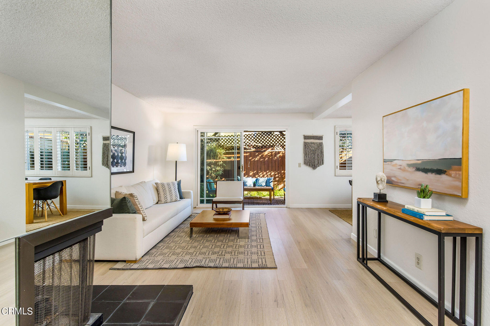 460 Fairview Avenue, Unit 12 Arcadia, CA 91007 - Photo 4 of 25 a living room with furniture and a table