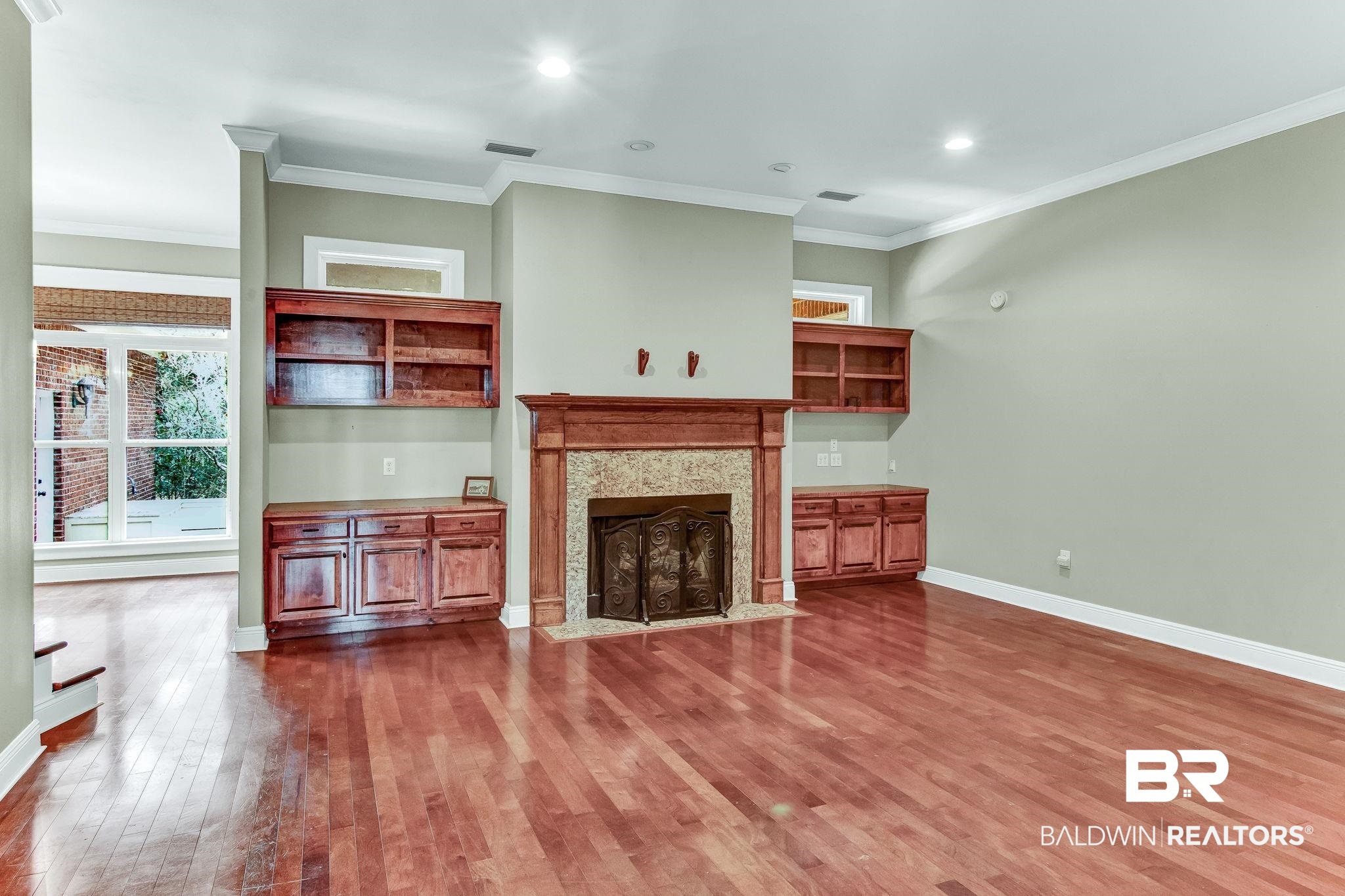 10561 McKenzie Road Fairhope, AL 36532 - Photo 23 of 48 Gas Fireplace & Built-in shelves