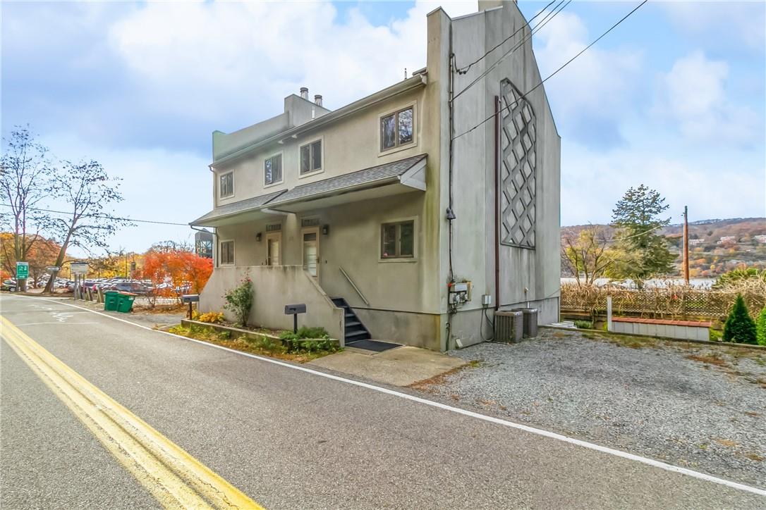 27 Lower Station Road Garrison, NY 10524 - Photo 1 of 1 a front view of a building with parking