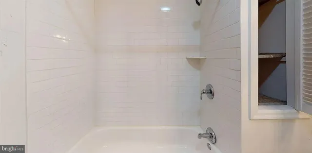 a close up of a bathtub