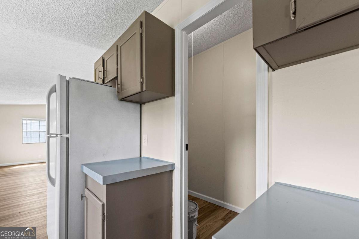 802 Allen Drive Vidalia, GA 30474 - Photo 22 of 29 a view of cabinets