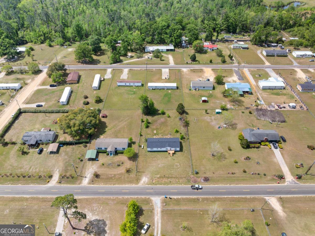 802 Allen Drive Vidalia, GA 30474 - Photo 8 of 29 an aerial view of residential houses with outdoor space