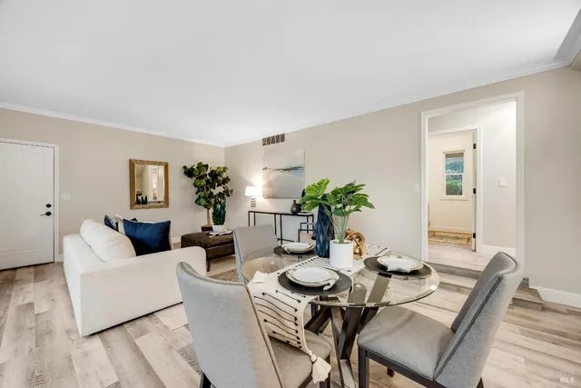a bathroom with a double vanity sink a mirror and shower