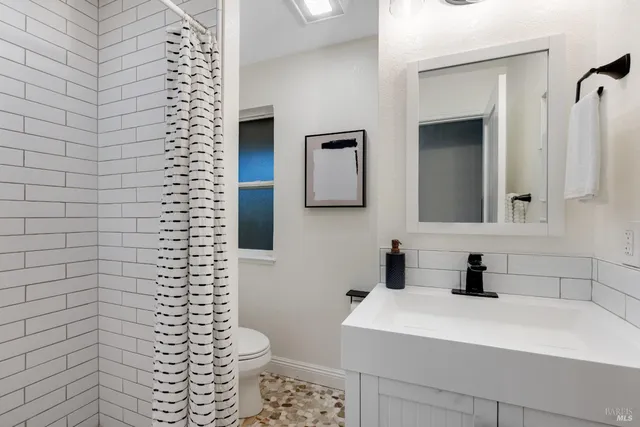 a view of a house with a big yard