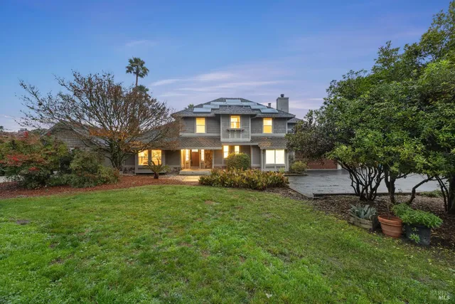 a big yard with flowing stream of water in middle