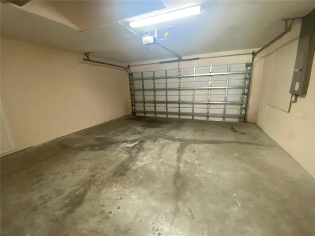 a view of a house with backyard and porch