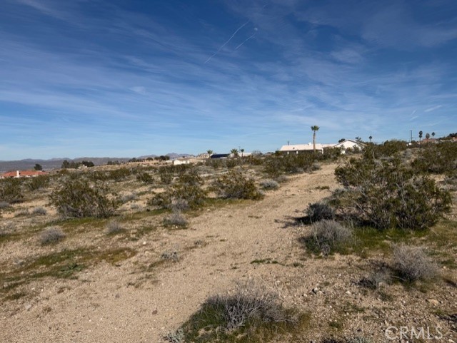 0 Calcite Street Barstow, CA 92311 - Photo 10 of 12 a view of a beach with a mountain in the background