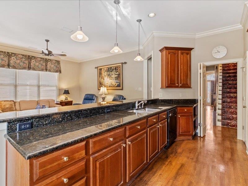 7999 Willow Brook Road Germantown, TN 38138 - Photo 8 of 29 Handsome cherry cabinets connecting to hearth room and breakfast area. New refrigerator.