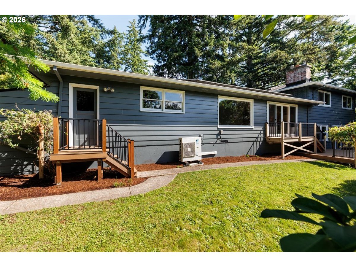 175 Northwest 95th Avenue Portland, OR 97229 - Photo 33 of 46 a view of a house with pool and chairs