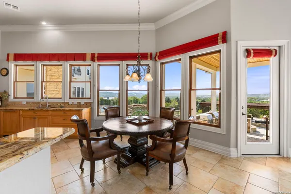 a view of living room with a large window