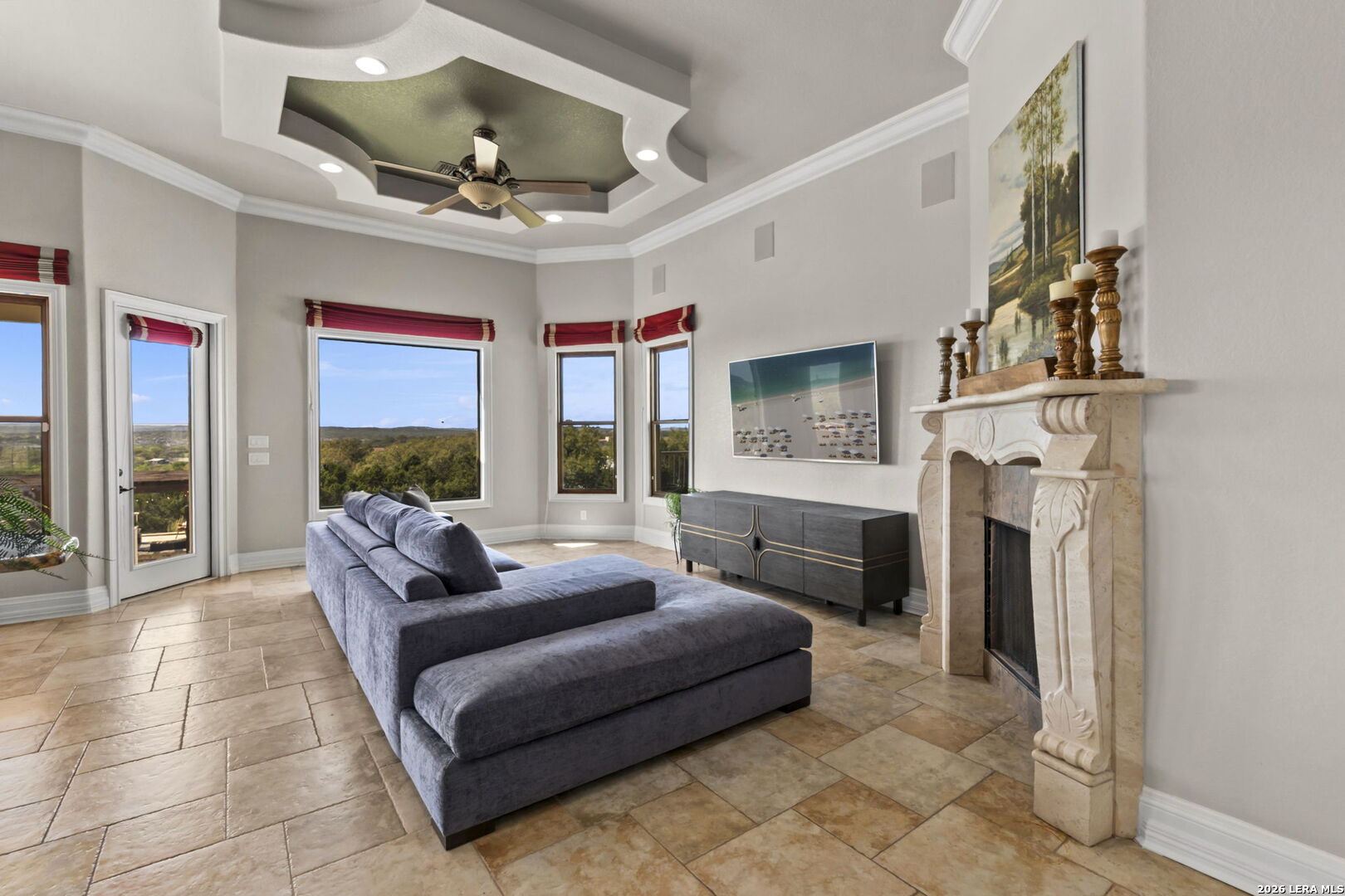 6762 Mnr Hl Road San Antonio, TX 78257 - Photo 21 of 51 a living room with furniture and a fireplace
