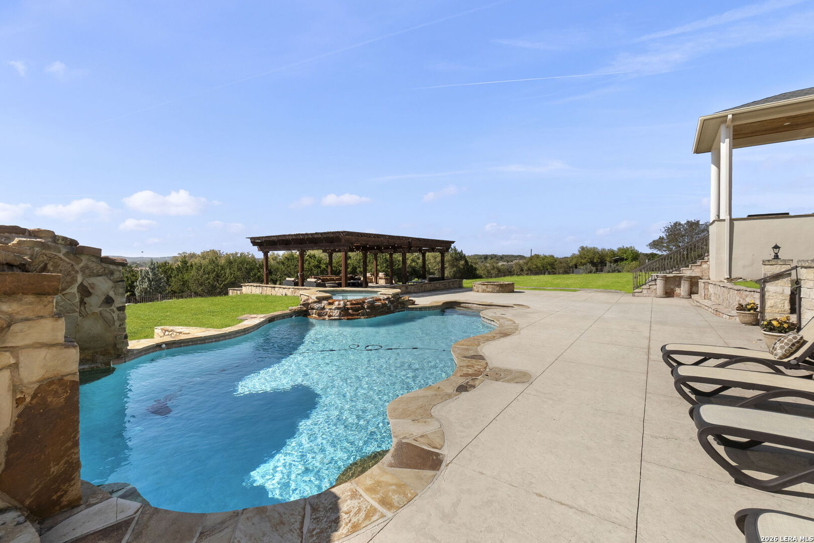 6762 Mnr Hl Road San Antonio, TX 78257 - Photo 44 of 51 a view of a swimming pool with a yard