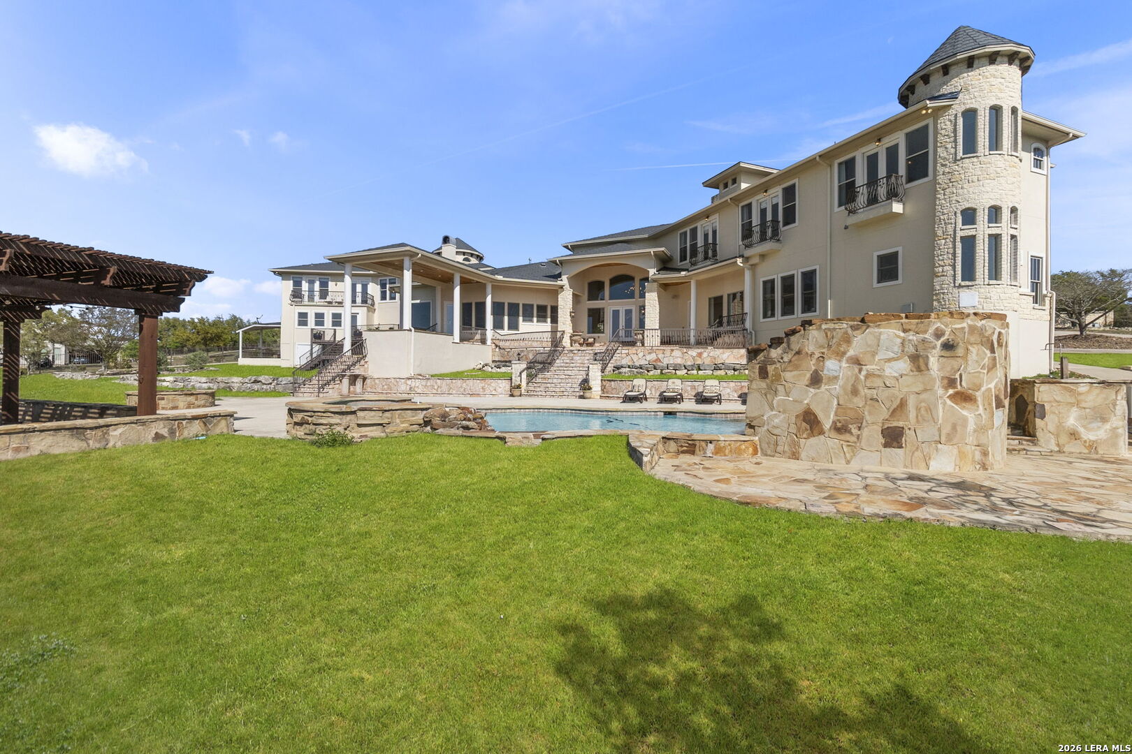 6762 Mnr Hl Road San Antonio, TX 78257 - Photo 50 of 51 a front view of a building with a yard