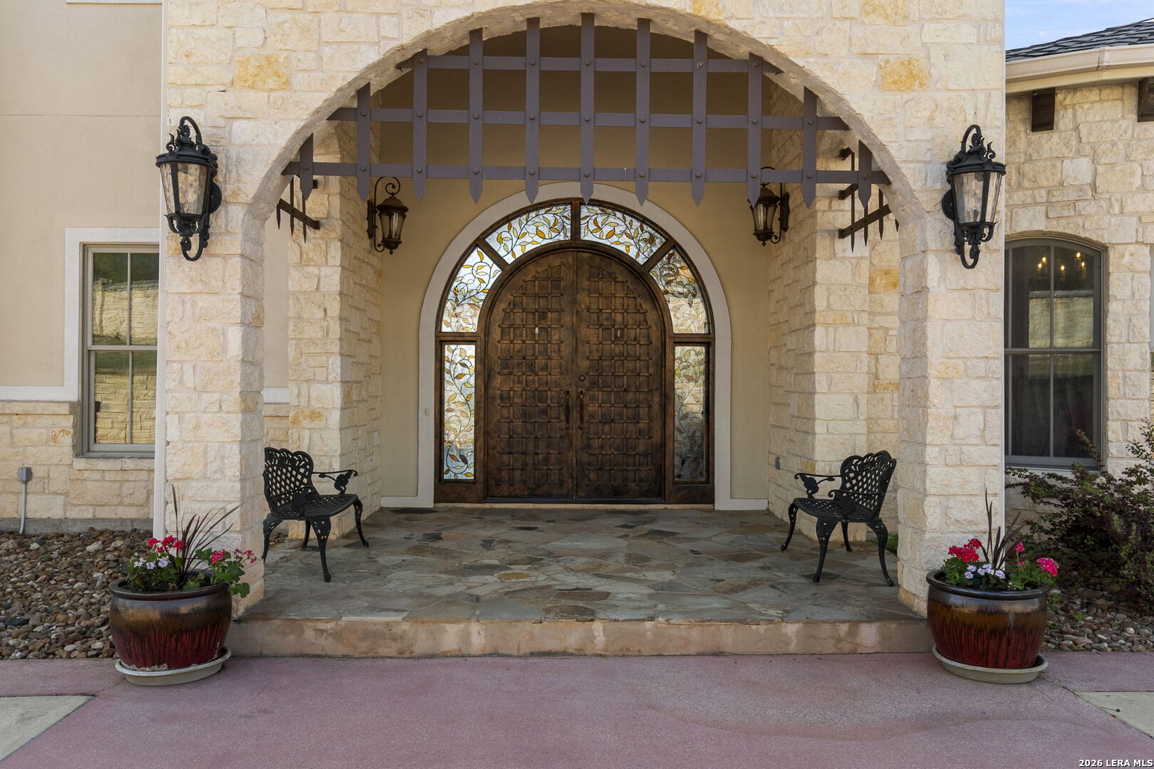 6762 Mnr Hl Road San Antonio, TX 78257 - Photo 9 of 51 a front view of a house with many windows