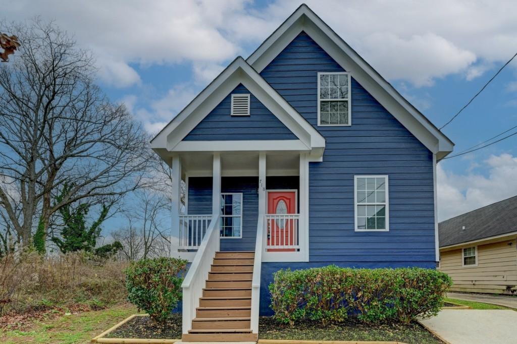 718 Fraser Street Southeast Atlanta, GA 30315 - Photo 1 of 1 a view of a house with brick walls and a yard with plants