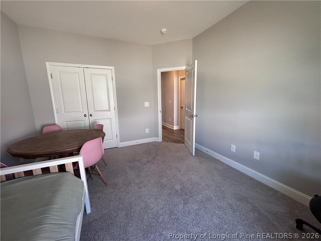 7720 Rufus Johnson Road Fayetteville, NC 28306 - Photo 37 of 50 a room with a table and chairs