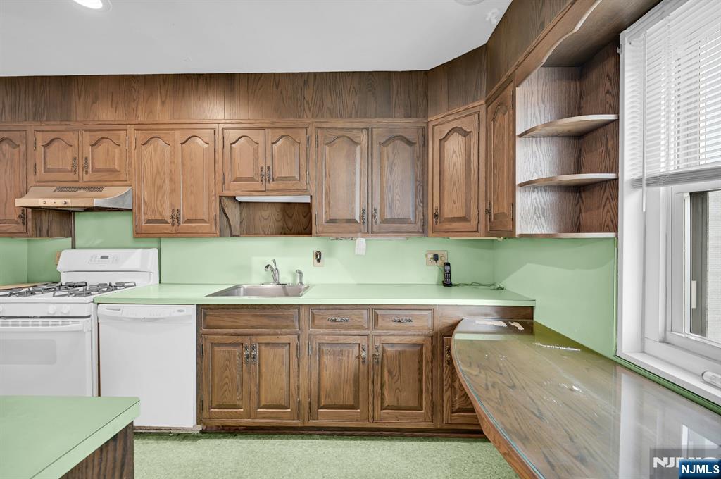 280 Prospect Avenue, Unit 3N Hackensack, NJ 07601 - Photo 13 of 23 a kitchen with stainless steel appliances granite countertop a sink and a stove
