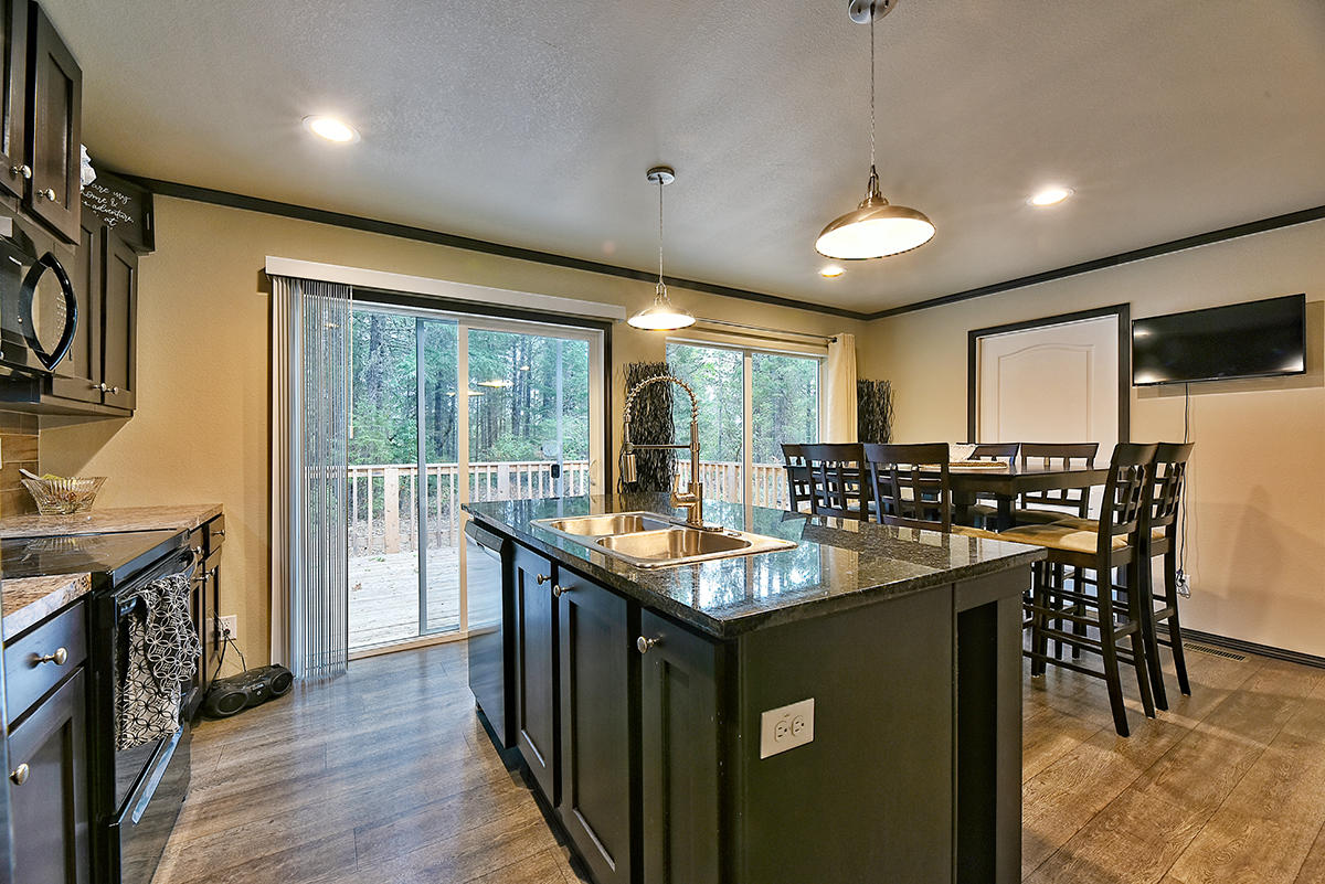 1011 Ferry Road Grants Pass, OR 97526 - Photo 8 of 21 a kitchen with lots of counter top space