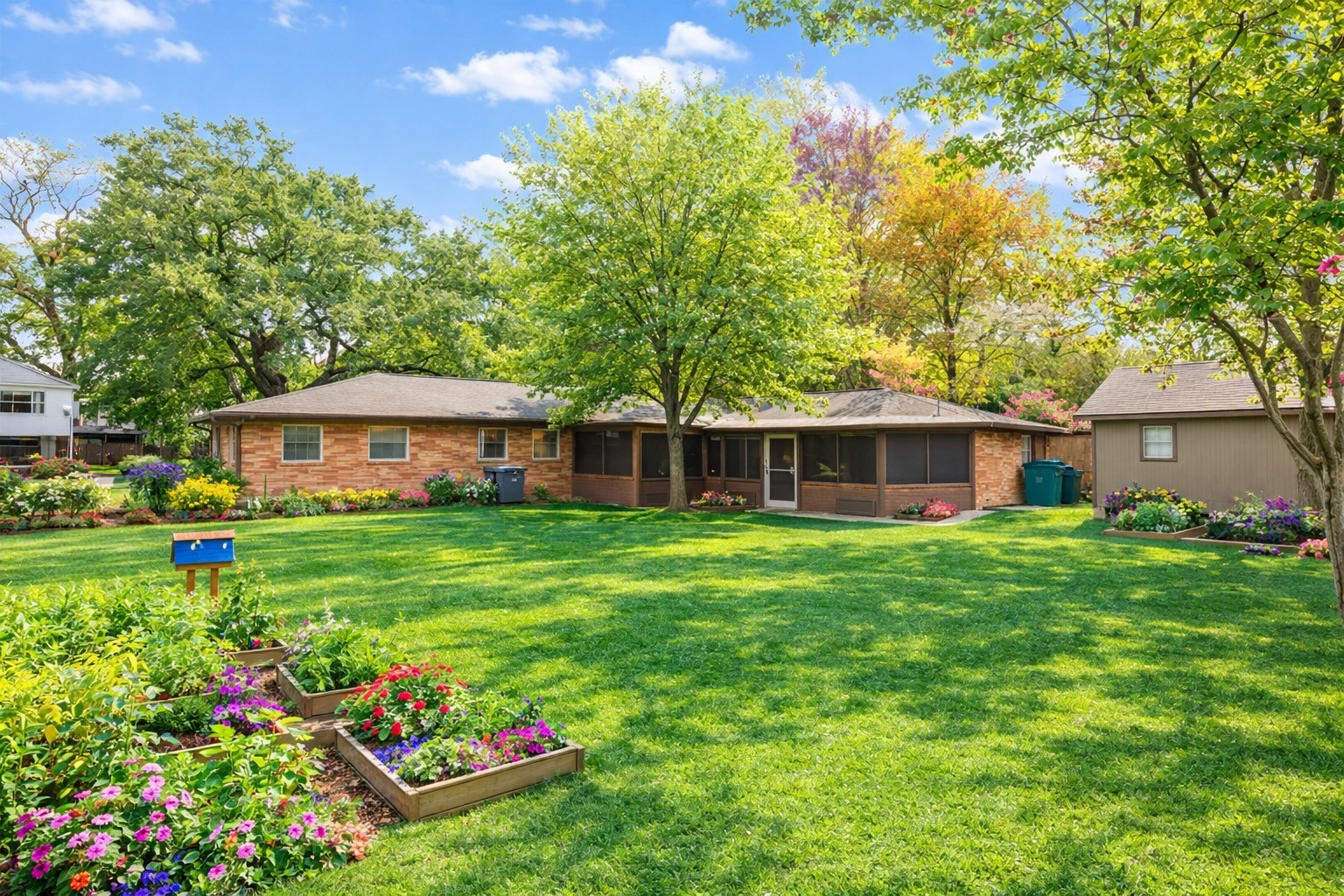 405 Hohldale Street Houston, TX 77091 - Photo 31 of 39 This enhanced photo highlights the yard’s potential, combining lush greenery and flower gardens; a serene and picturesque setting perfect for tranquil living.