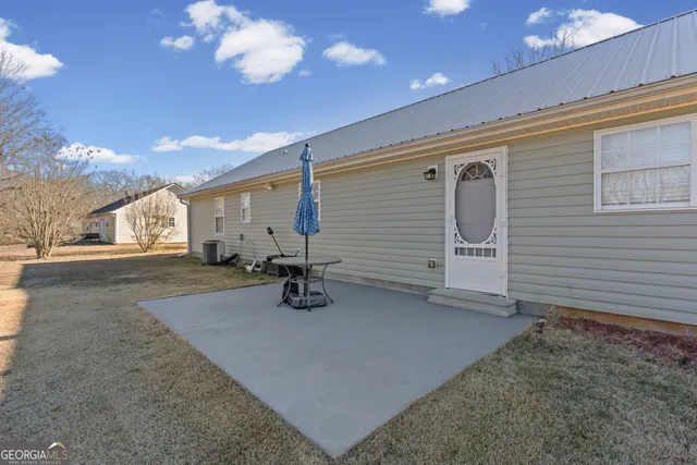 a view of a house with a patio