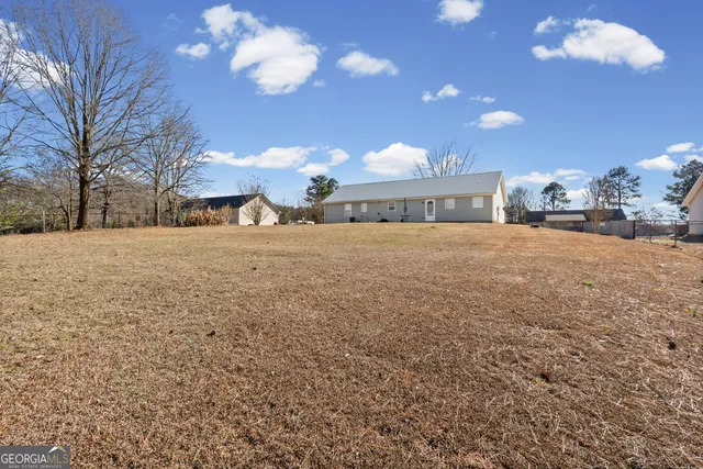 a view of an empty room with a yard