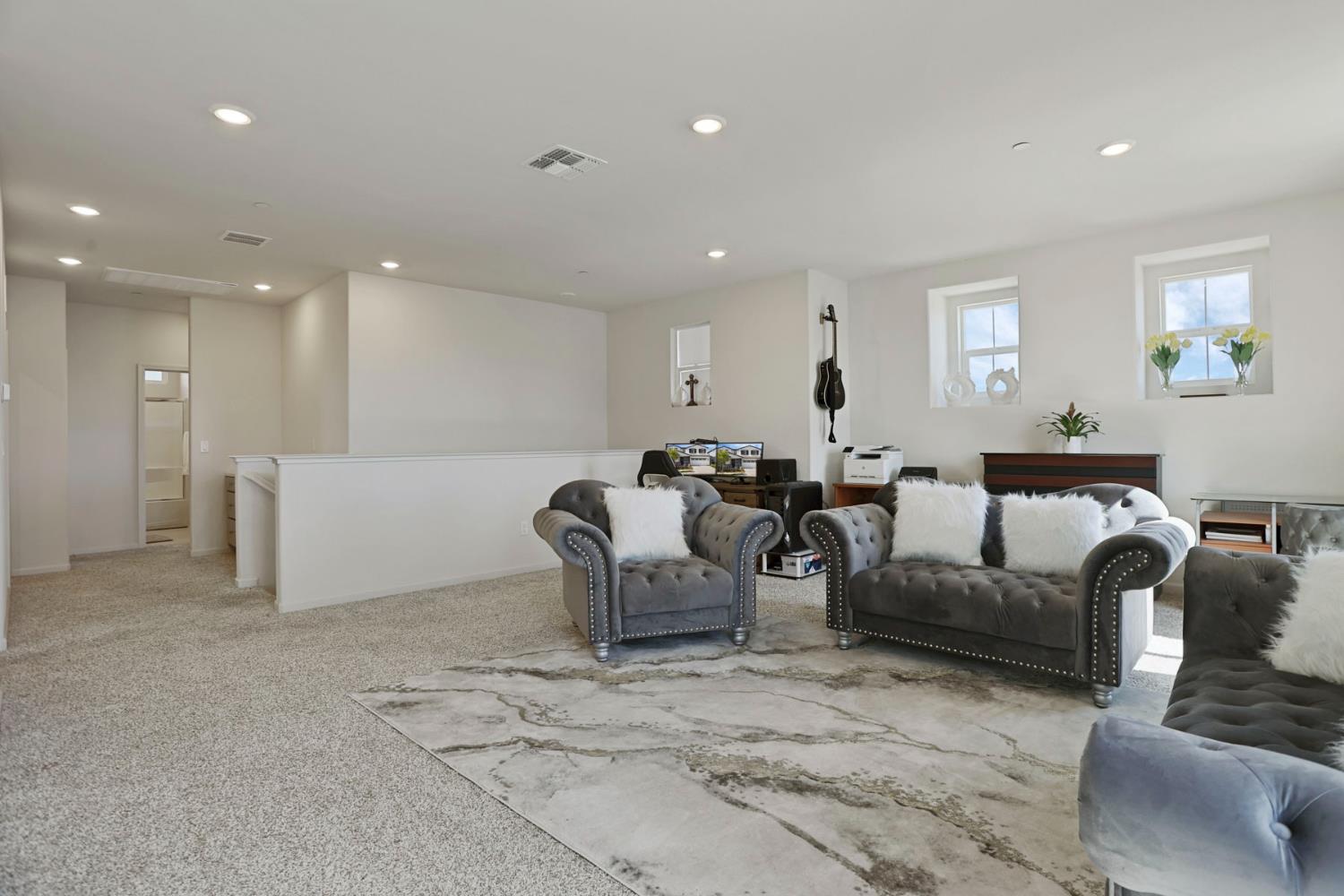 6949 Foraker Drive Stockton, CA 95219 - Photo 21 of 34 a living room with furniture