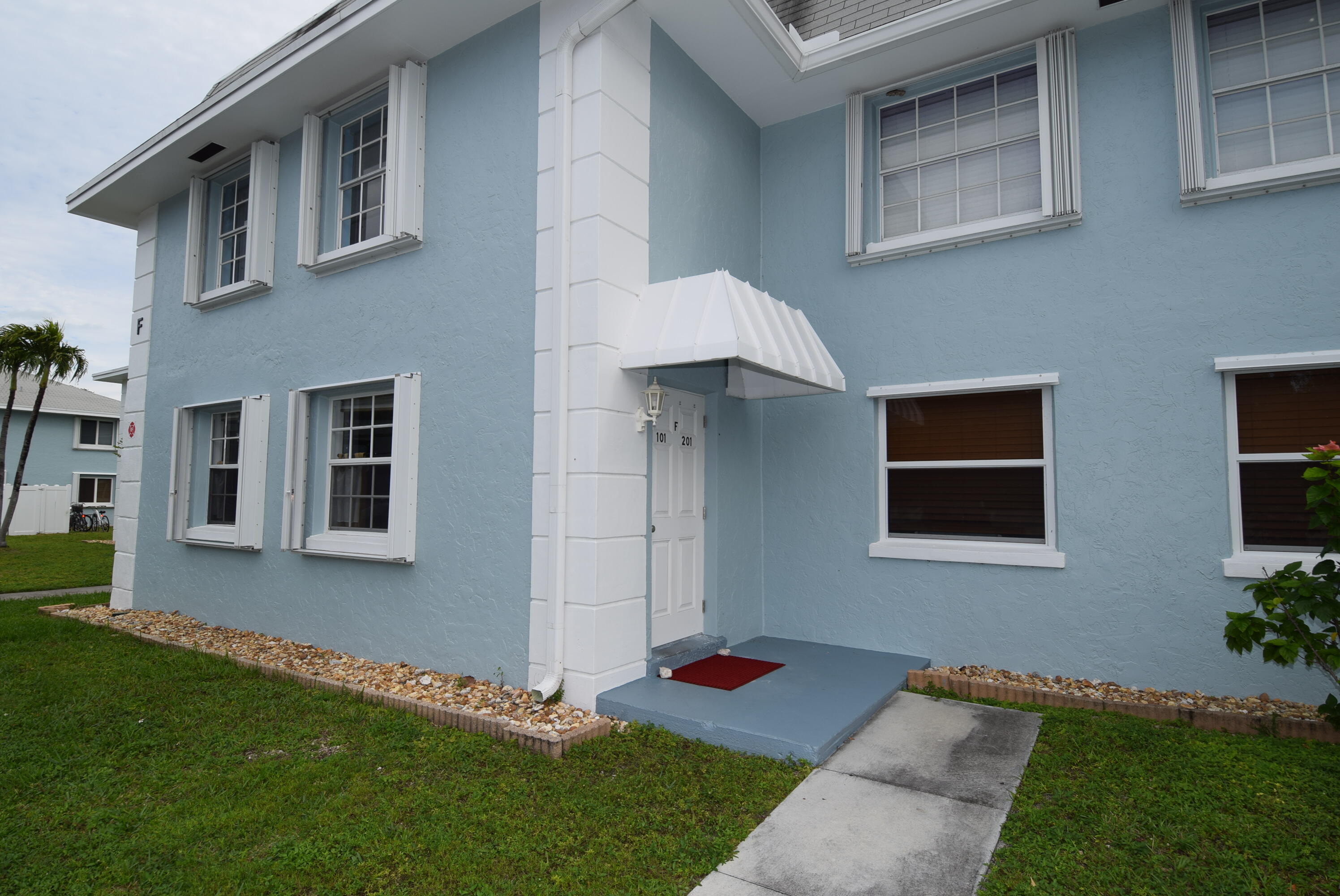 40 High Point Road, Unit F201 Tavernier, FL 33070 - Photo 2 of 11 a view of backyard of a house