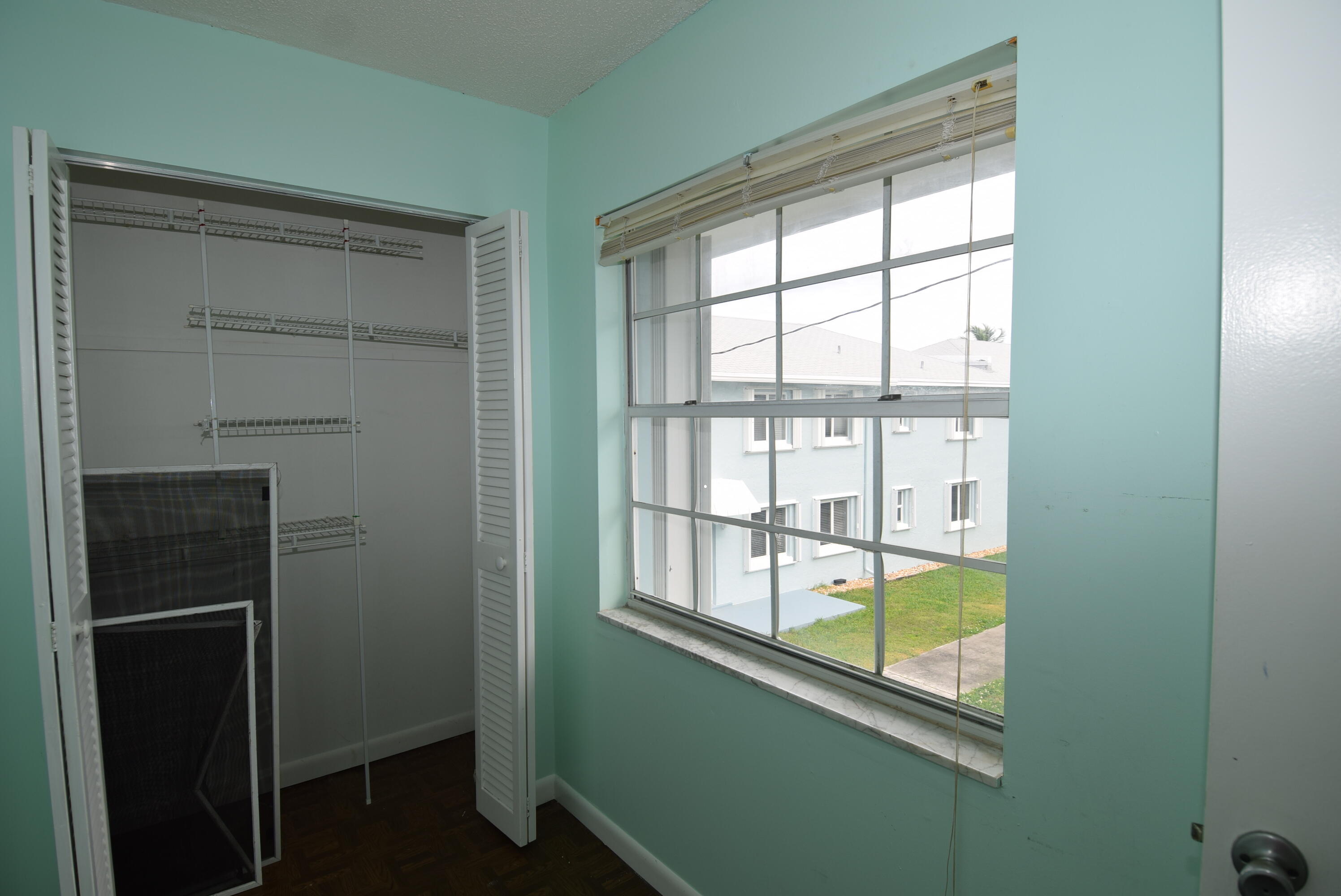 40 High Point Road, Unit F201 Tavernier, FL 33070 - Photo 10 of 11 a view of a small space with a window