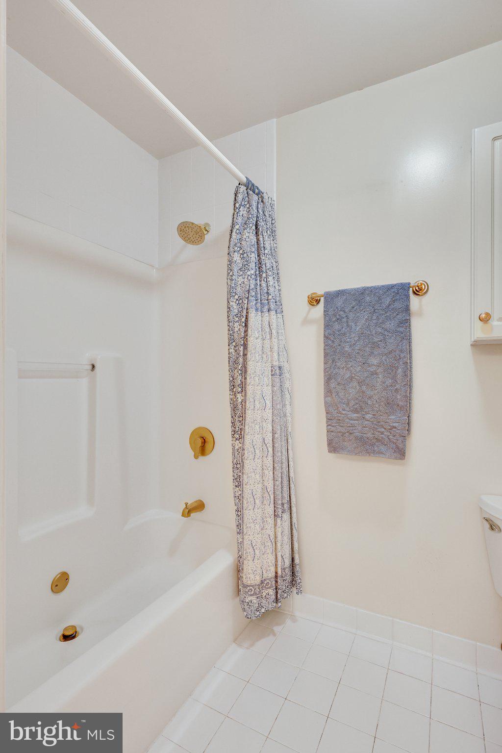 1427 Laurel Hill Road Vienna, VA 22182 - Photo 35 of 57 Elegant bathroom with gold accents.