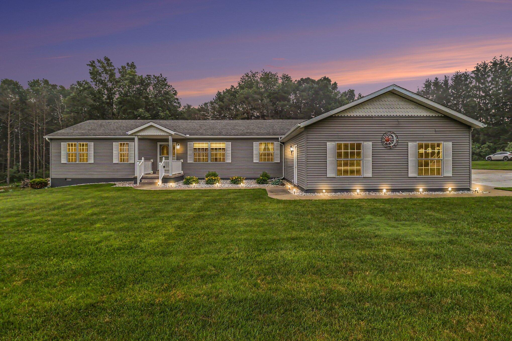 986 West Fox Farm Road Manistee, MI 49660 - Photo 2 of 31 Twilight photo