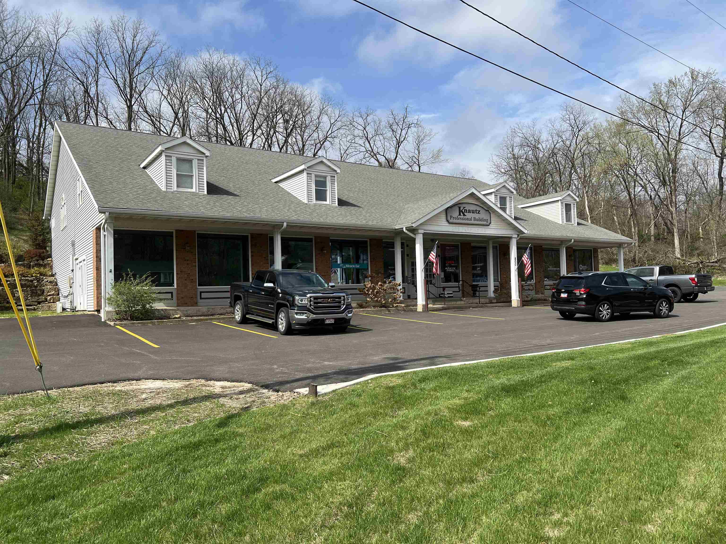 800 Spring Street Galena, IL 61036 - Photo 1 of 13 a view of a big yard with table and chairs under an umbrella