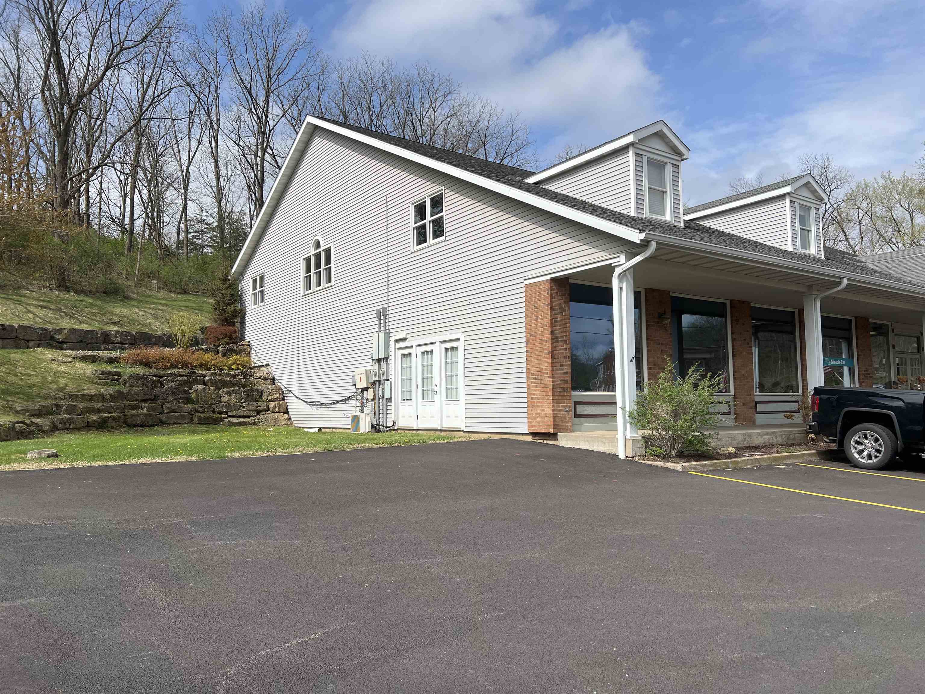 800 Spring Street Galena, IL 61036 - Photo 9 of 13 a view of a house with backyard and parking area