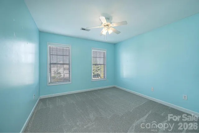 a view of balcony with wooden floor and fence