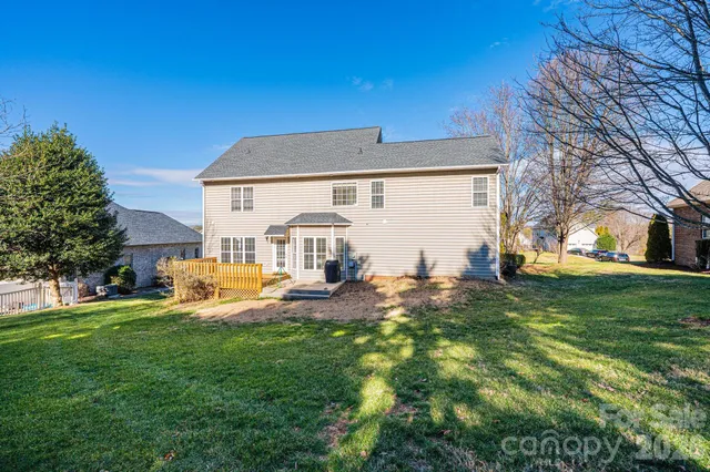 a view of a house with a big yard