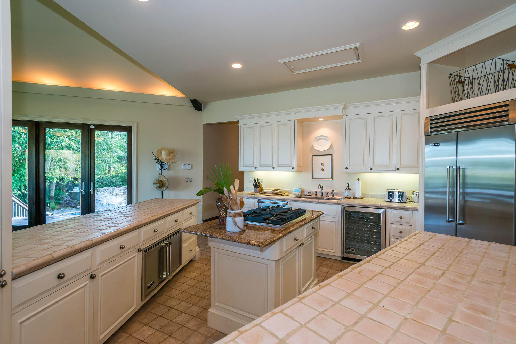 279 Grayton Trail Road Santa Rosa Beach, FL 32459 - Photo 11 of 55 a large kitchen with stainless steel appliances kitchen island granite countertop a sink and cabinets
