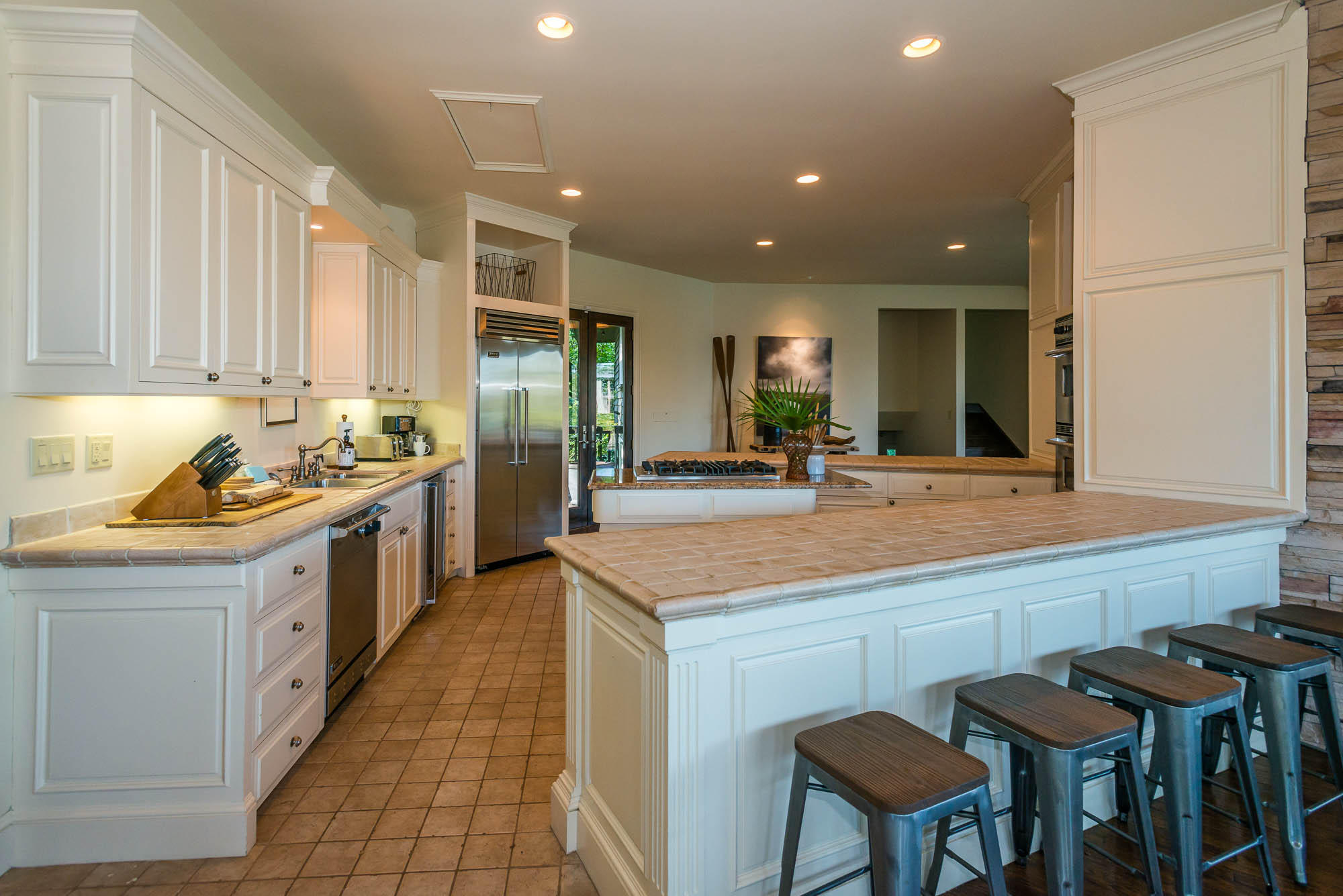 279 Grayton Trail Road Santa Rosa Beach, FL 32459 - Photo 12 of 55 a kitchen with stainless steel appliances granite countertop a sink and a refrigerator