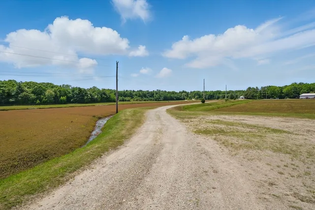 a view of a lake with a big yard