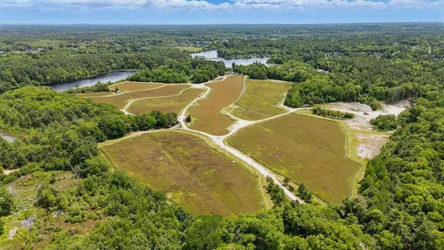 an aerial view of residential house with outdoor space