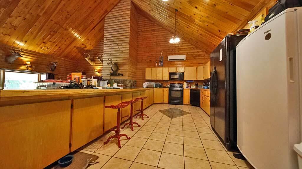 97 South Oakfield Road Linneus, ME 04730 - Photo 33 of 78 kitchen-home-log-tile
