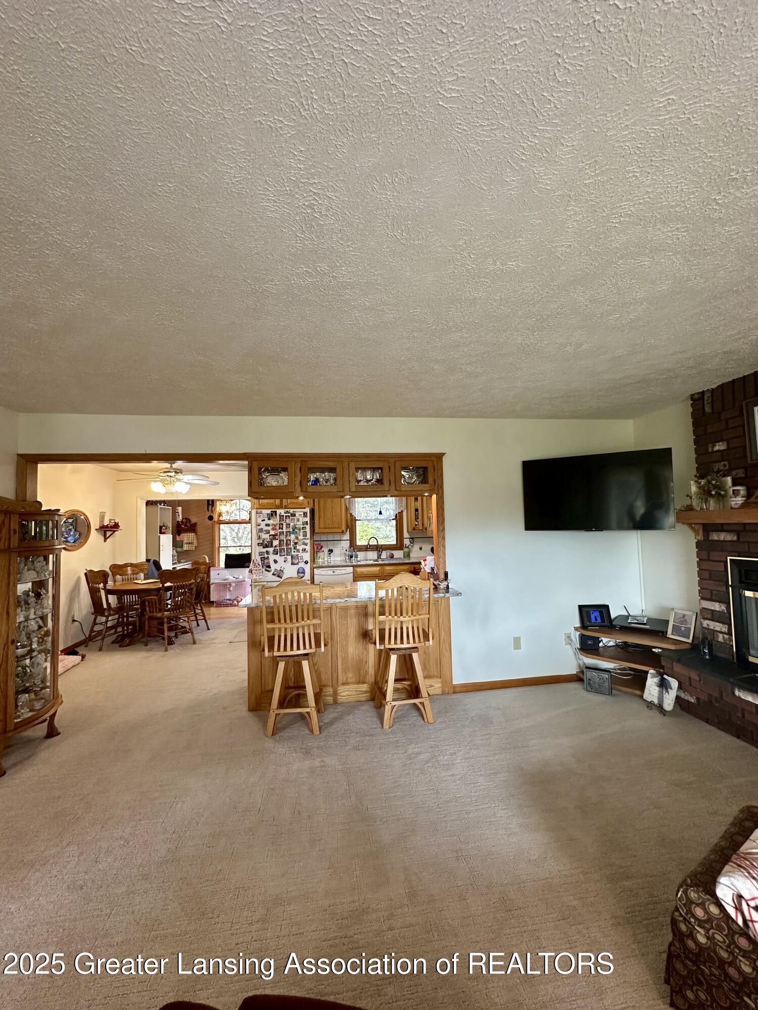 1630 West Kinley Road St. Johns, MI 48879 - Photo 10 of 46 Living room to kitchen
