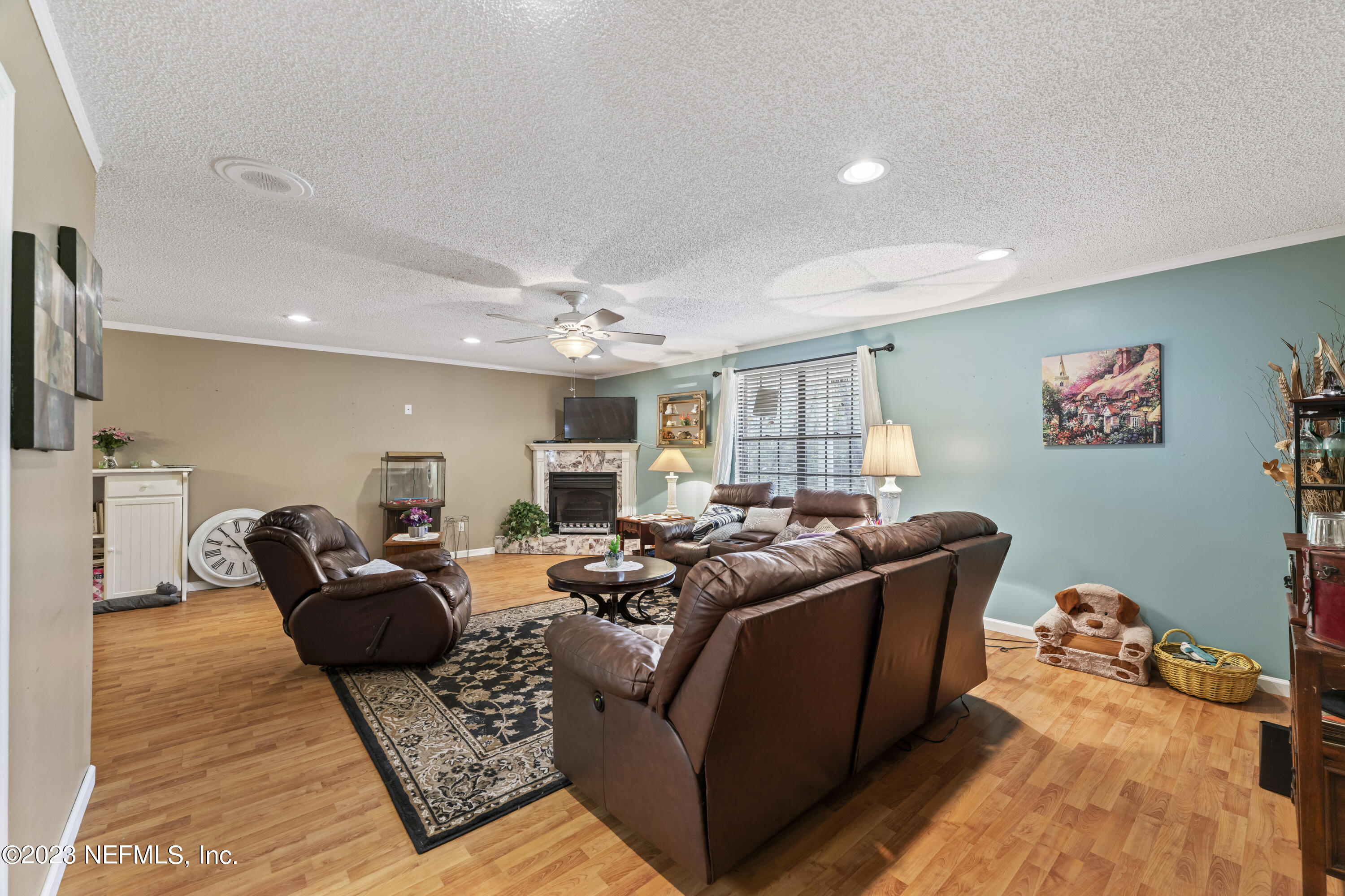 7349 Oakridge Loop Glen St. Mary, FL 32040 - Photo 15 of 56 a living room with furniture