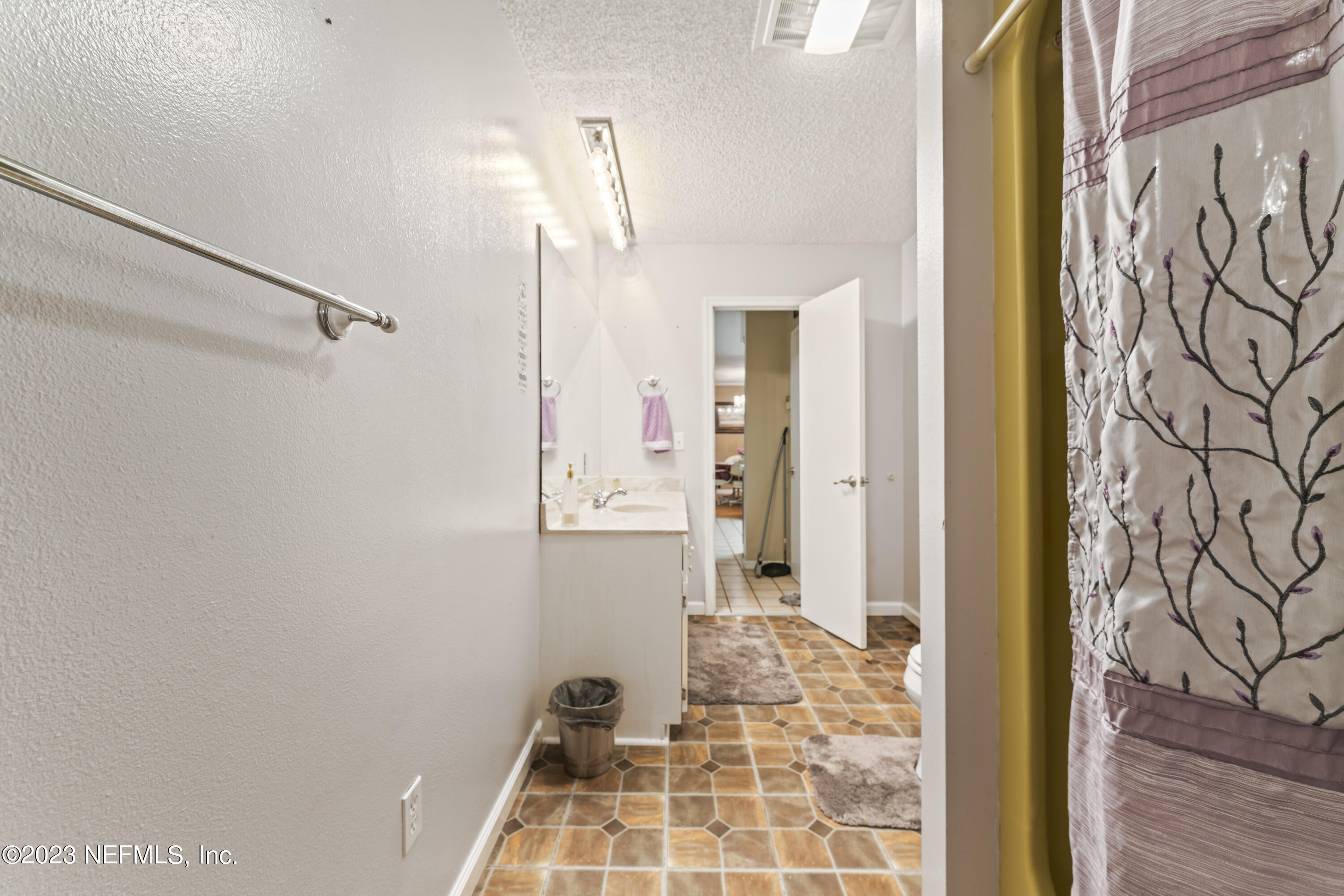 7349 Oakridge Loop Glen St. Mary, FL 32040 - Photo 26 of 56 a bathroom with a bathtub and shower