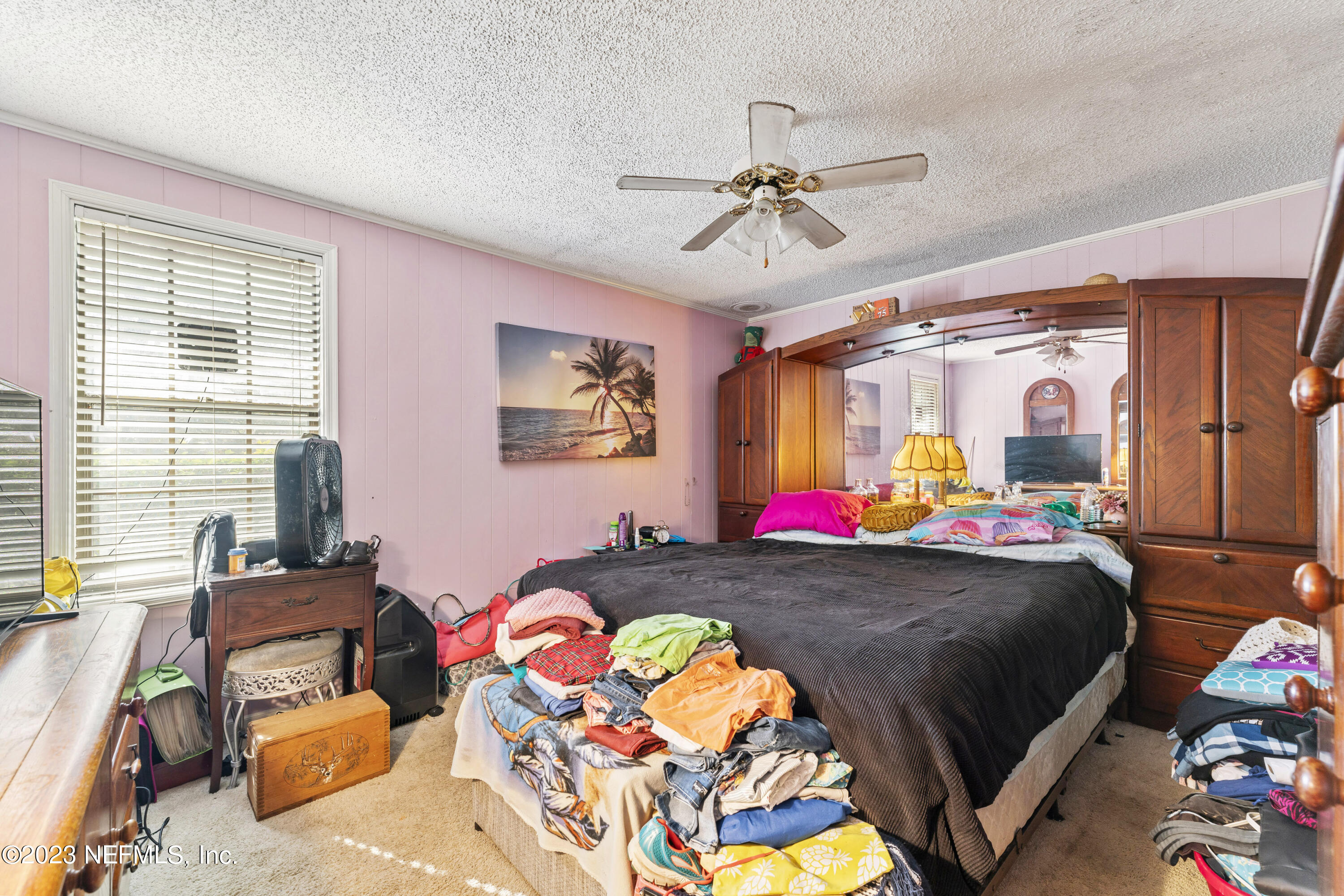 7349 Oakridge Loop Glen St. Mary, FL 32040 - Photo 31 of 56 a bedroom with bed and window