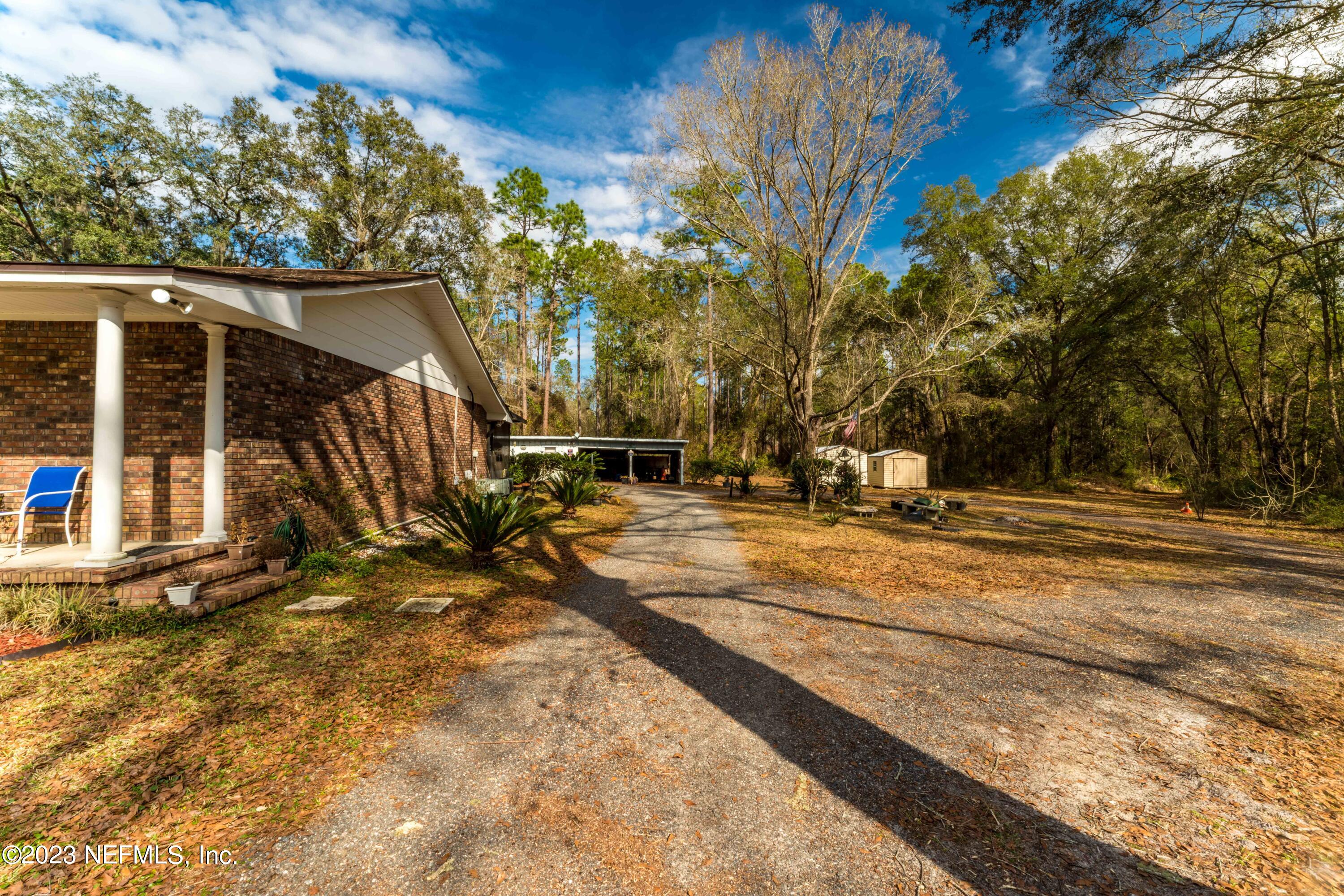 7349 Oakridge Loop Glen St. Mary, FL 32040 - Photo 32 of 56 Shop w/ Carport