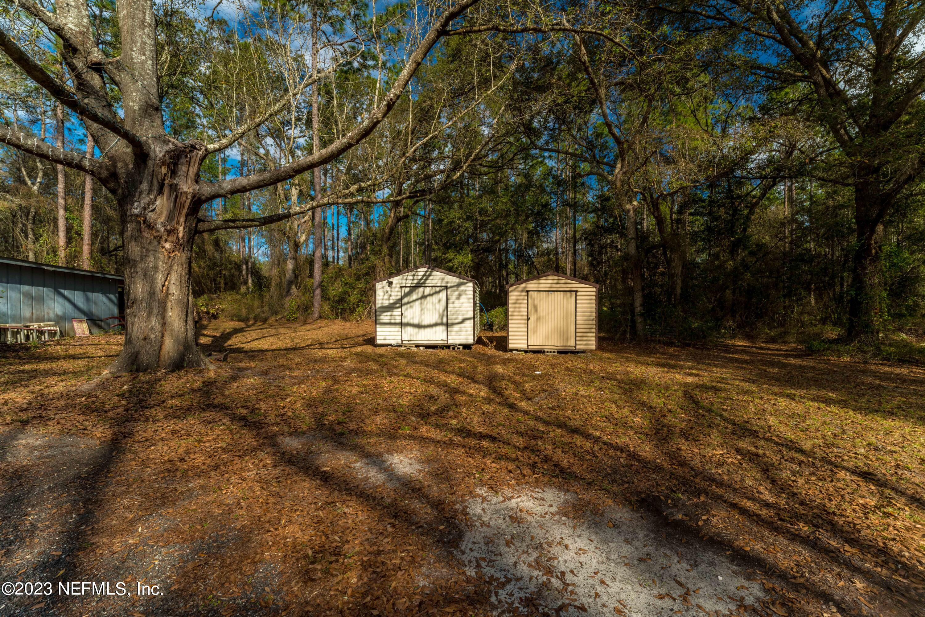 7349 Oakridge Loop Glen St. Mary, FL 32040 - Photo 34 of 56 a backyard of a house