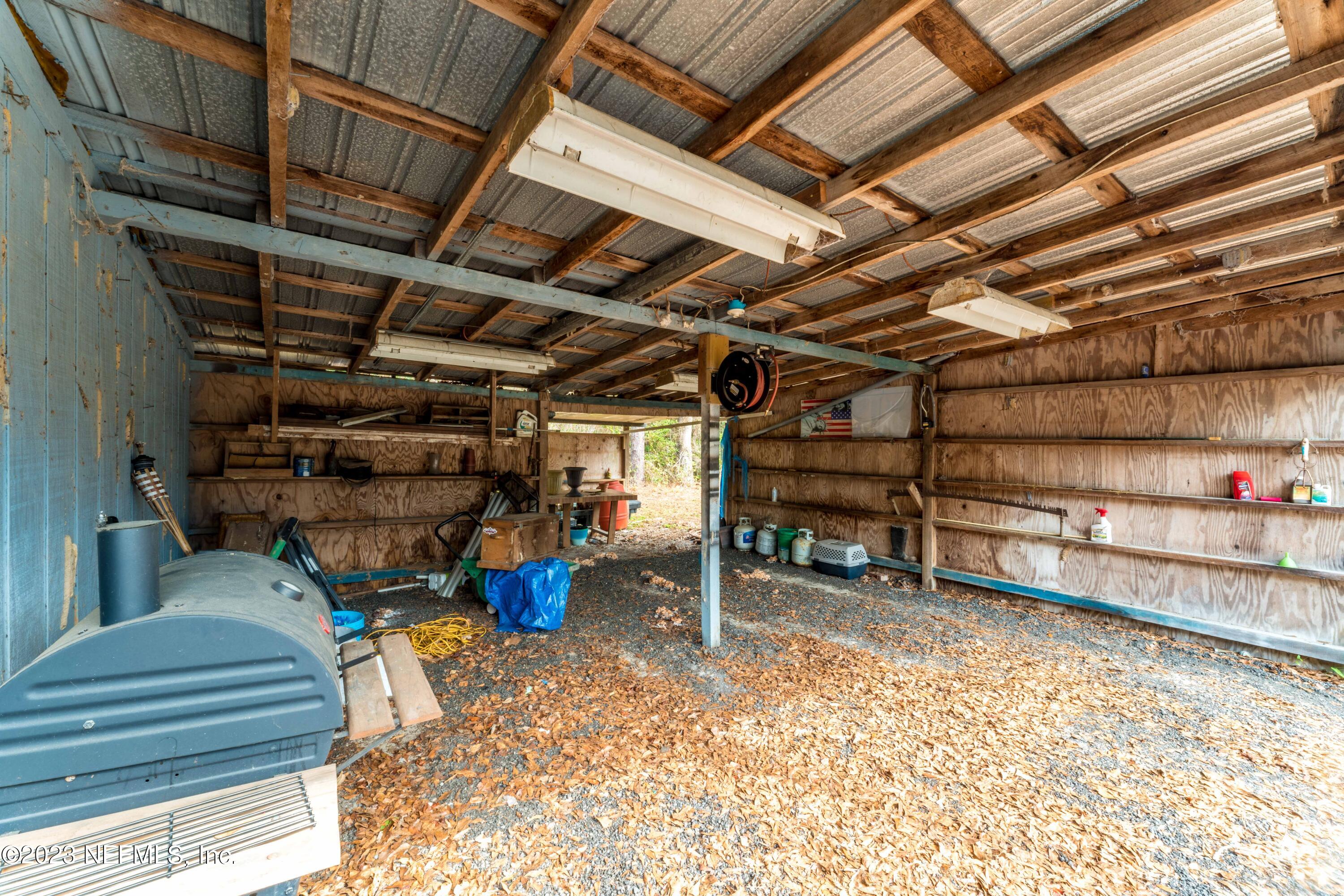 7349 Oakridge Loop Glen St. Mary, FL 32040 - Photo 41 of 56 a view of storage and utility room