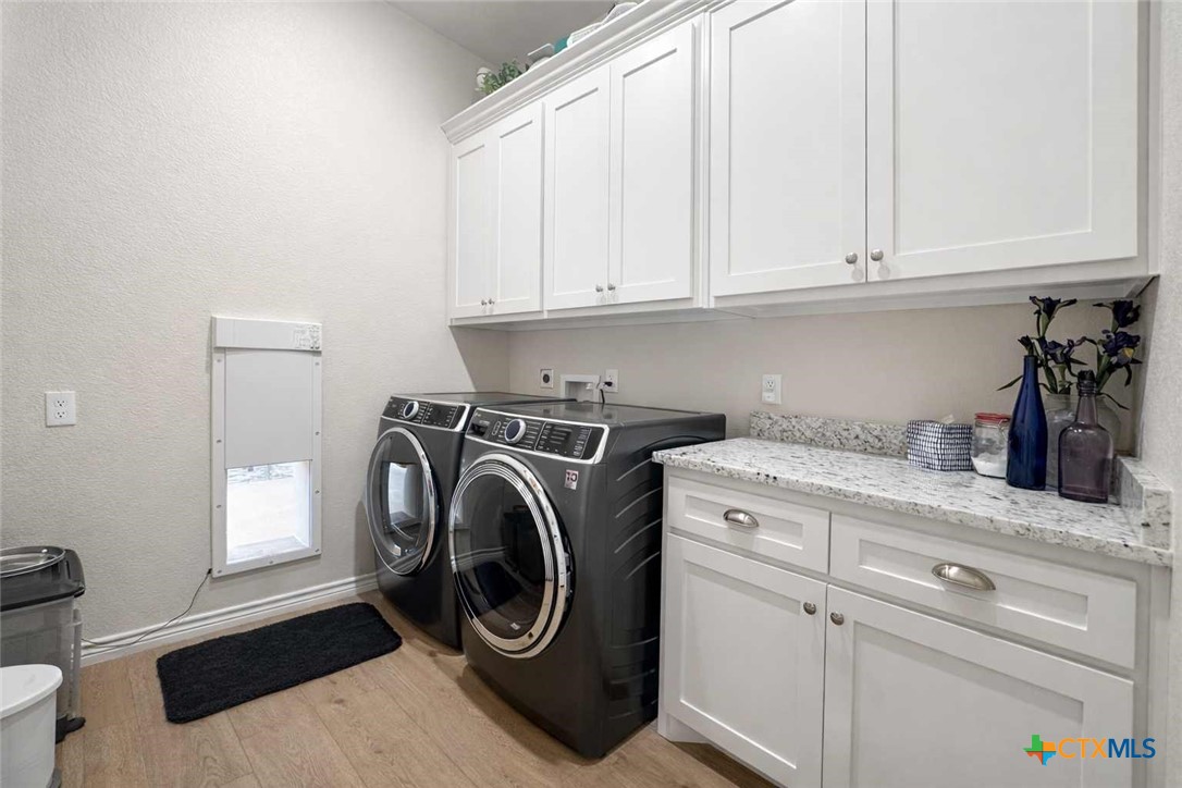 705 Indian Hills Road Gatesville, TX 76528 - Photo 28 of 43 a utility room with dryer and washer